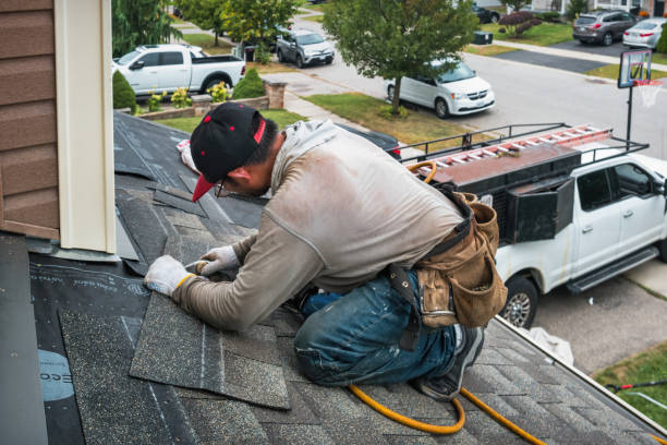 Professional Flat Roof Repair technician working in Camp Sherman, OR